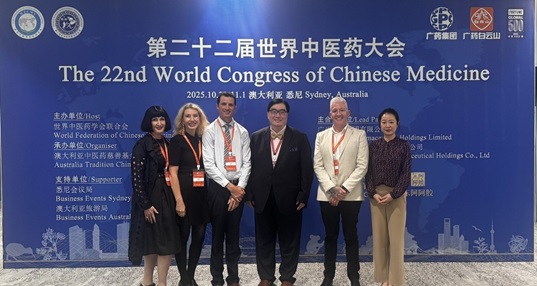 CMBA members in front of international congress sign