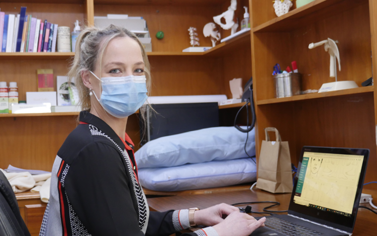 Chinese medicine practitioner at work in Australia