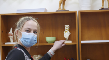 Chinese medicine practitioner wearing mask